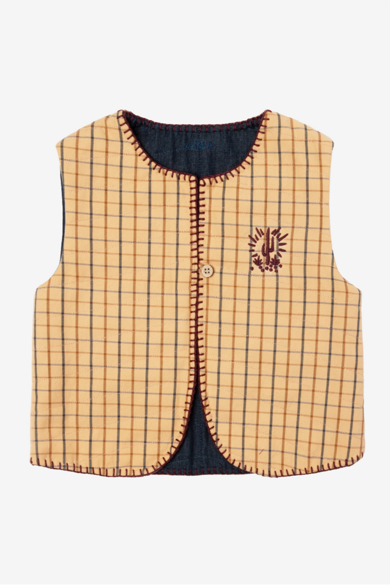 Gilet bébé café crème.